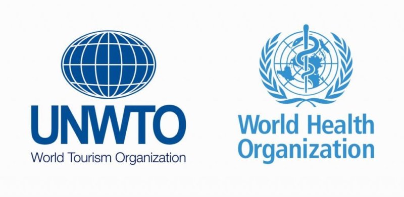 לוגו של ארגון התיירות העולמי ושל ארגון הבריאות העולמי