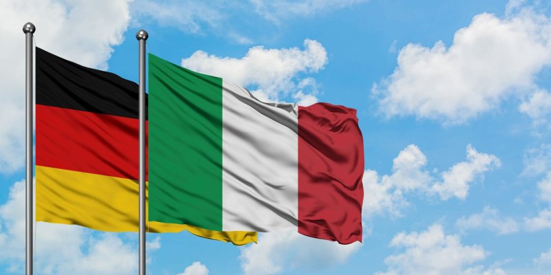 דגלי איטליה וגרמניה. צילום: שאטרסטוק|מגדל פיזה